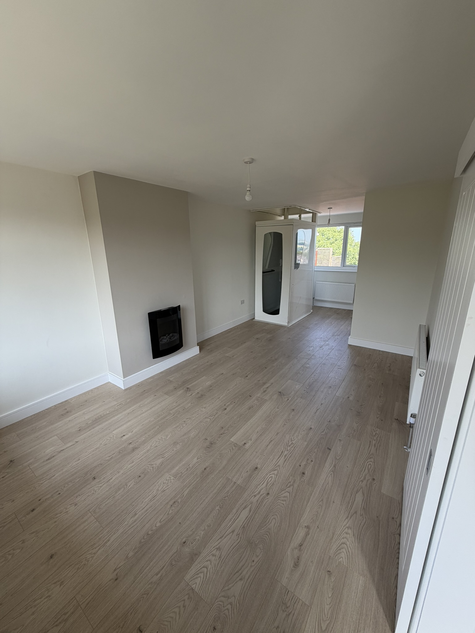 Reception room with through floor lift accessible property to rent Bolton Lancashire AccessiblePRS