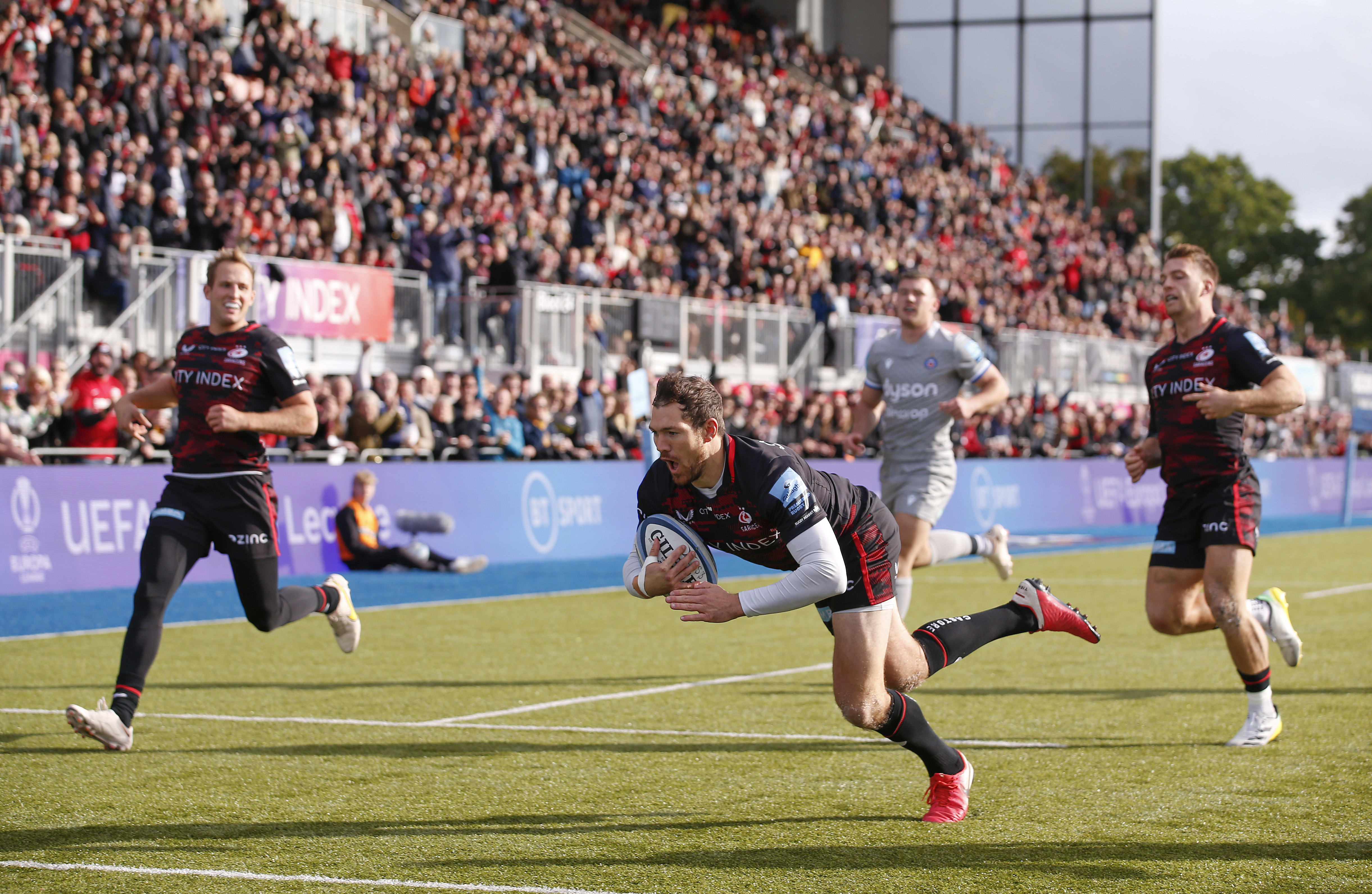 Saracens player scores a try.