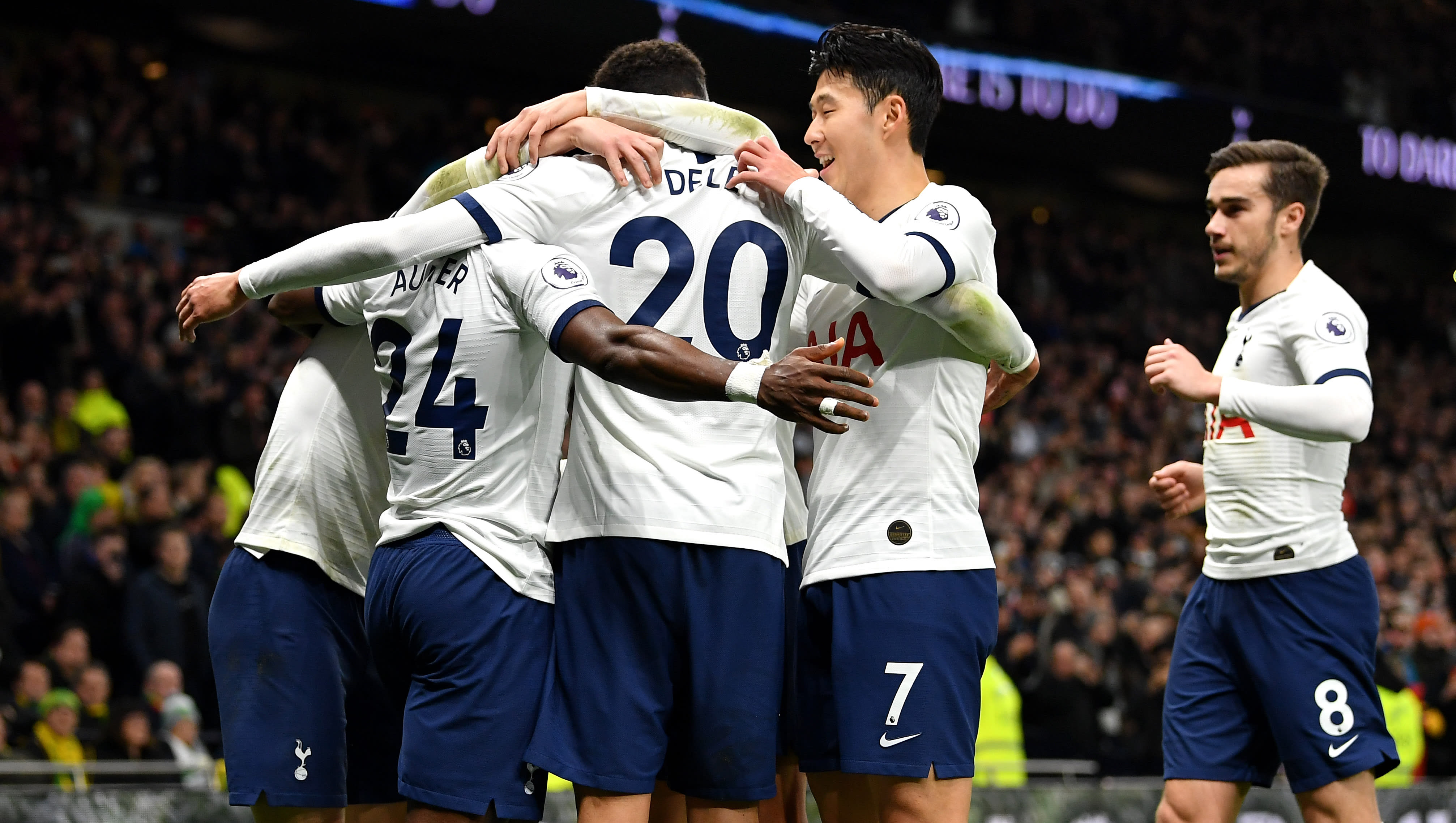Tottenham players celebrate after scoring a goal
