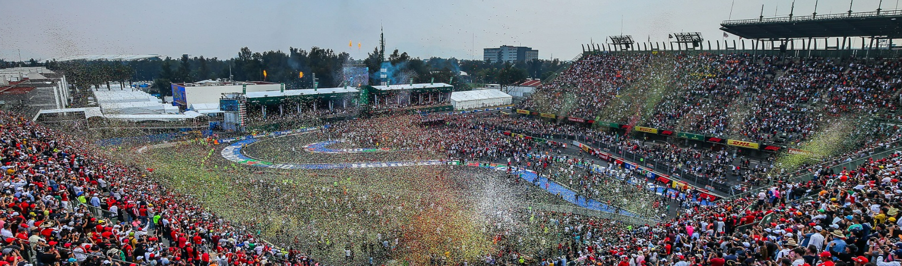 The Foro Sol stadium section at the end of a race with fans celebrating.