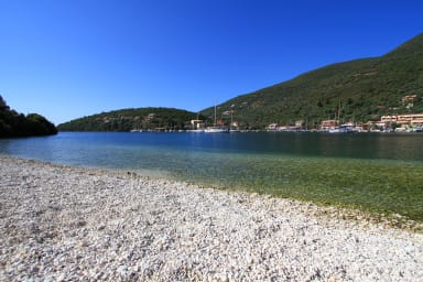 Small pebble beach just below the villa