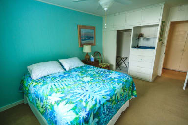 air-conditioned bedroom with queen size bed