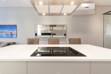 Kitchen island with cooking top and eating area