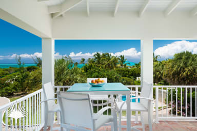 Reef Pearl's outdoor dining table for 4 guests.