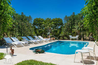 Reef Pearl's private pool with loungers.