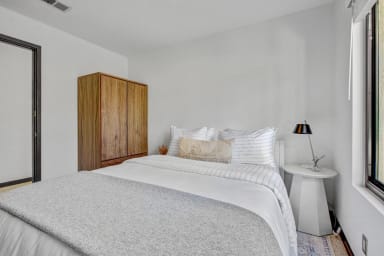 Comfortable bedroom with queen bed and inviting layout