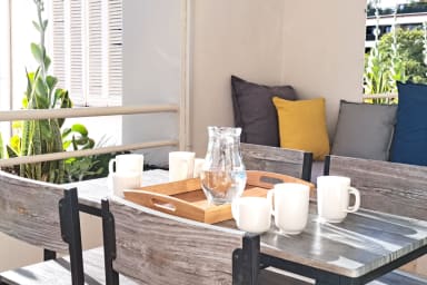 Terrasse - Coin repas et banquette confortable