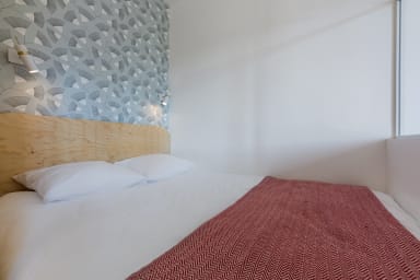 Un lit douillet pour profitez de vos nuits.