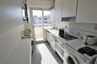 Fitted kitchen opening onto the terrace