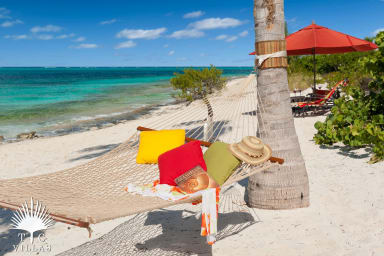 Turtle Beach offers a beachfront hammock for guests to enjoy.
