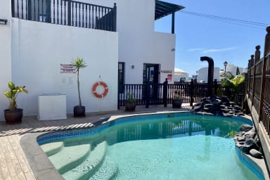 Villa Mimosa - Ferienhaus in Punta Mujeres mit Gemeinschaftspool 