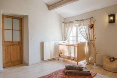 The cot in Bedroom 5