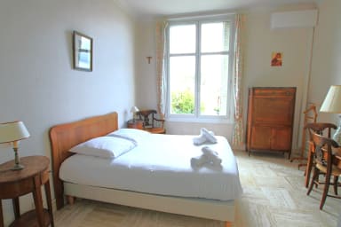 Air-conditioned bedroom with double bed