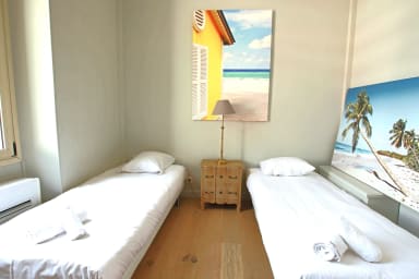 First bedroom with 2 singles beds + large cupboard