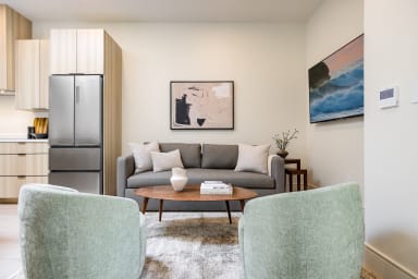 Seating area with sofa and lounge chairs