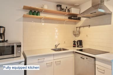 Fully equipped kitchen and dining area