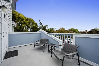 Private balcony with two chairs and serene views