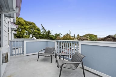 Private balcony with two chairs and serene views