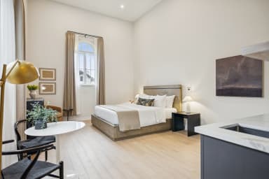 California King bed, sleeps 2, seating area, smart TV