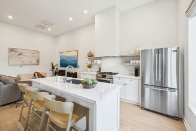 Full kitchen: Nespresso, fridge, stove/oven, plates and utensils, dishwasher