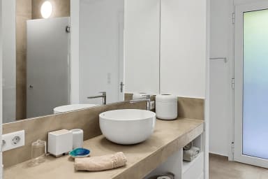 Polished vanity area offers a calming spot for daily routines and pampering.