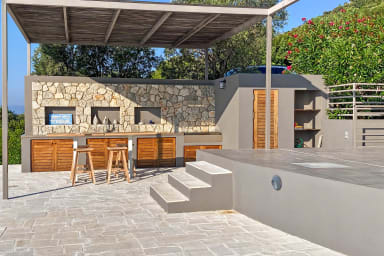 Alfresco kitchen and bar invite you to savor local flavors outdoors.