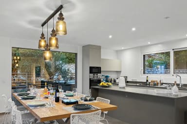 Modern kitchen and dining perfect for memorable meals and evening gatherings.