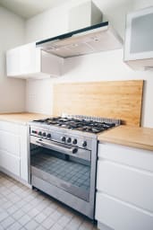 Fully-equipped kitchen with a gas stove