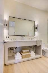 En-suite bathroom with rain shower and high-end toiletries