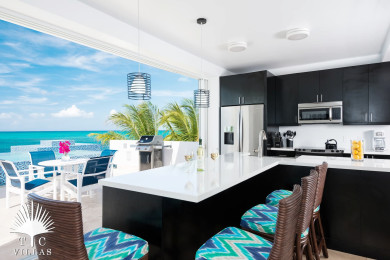 Open-concept kitchen and living area on Plum Wild's second level. 