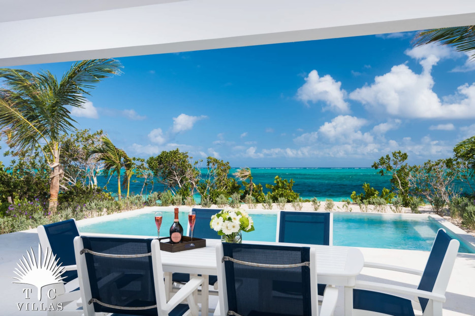 Private pool (25x18), dining table, BBQ grill, and beach views.
