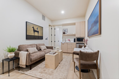 Seating area with sofa and lounge chairs
