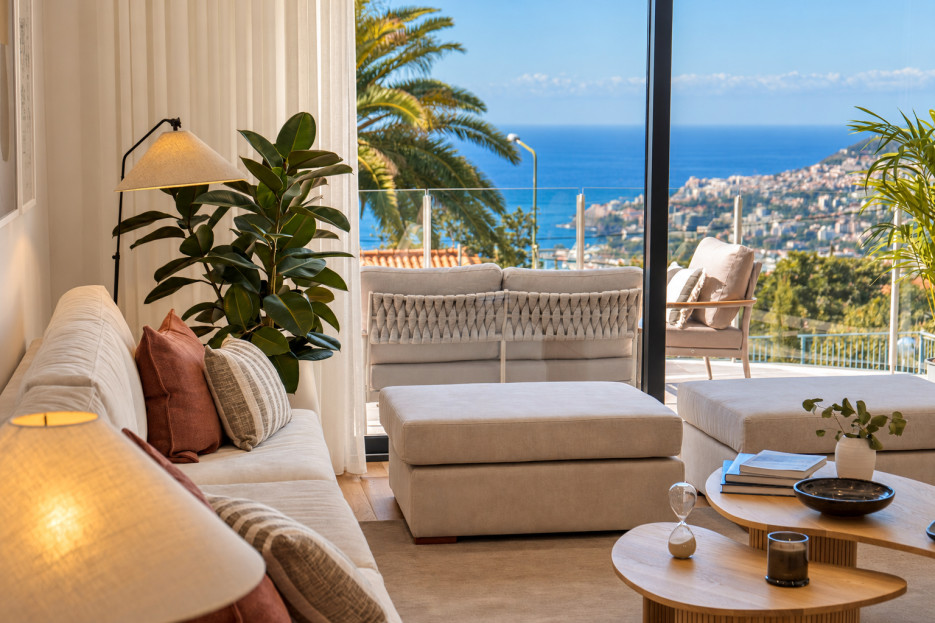 Casa Mirante — Living room and terrace overlooking Funchal Bay, Madeira.