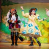 Kat B as Puss in Boots, Stephen Matthews as Dame Nettie Knowall and Matt Dempsey as Thomas