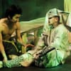 Dmitry Ser as Mowgli and Michael Gonsalves as Baby Elephant