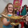 Sophie Sheridan-Westgate, Eve Smallwood and Claudia Gilmour dressing up in an assortment of costumes at the exhibition