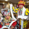 Ray Spencer as Dame Bella Ballcock and David John Hopper as Arbuthnot Hopper count panto tickets in the Customs House box office