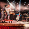 Alice (Alex Tahnee) and the student ensemble
