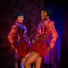 Showgirl Dora (Melissa James) and Showgirl Nora (Omari Douglas)
