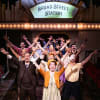 Kate-Anne Fenton as Peggy Sawyer with the Company