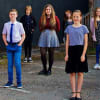 The children whose lockdown stories were turned into films by Heartbreak along with two of the actors who appeared in some of the stories