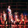 Karl Queensborough and the West End cast of Hamilton