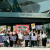 Equity & MU members who work at the ENO with supportive London Assembly members outside City Hall