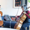 Thangam Debbonaire with Caroline Dearnley, first cellist of the Britten Sinfonia
