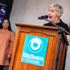 Julie Hesmondhalgh announcing the reopening of Oldham Coliseum outside the theatre