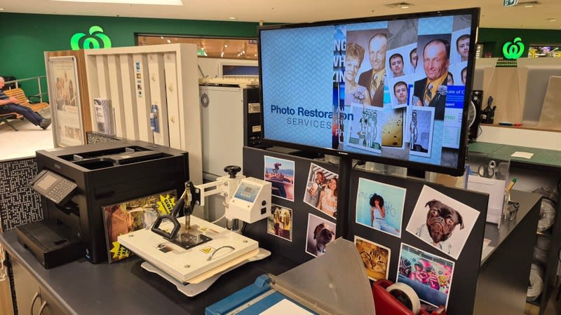 Busy Photographic shop in popular Shopping Centre Busy Photographic shop in popular Shopping Centre