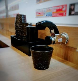 Japanese Tea at A Conveyer Belt Sushi