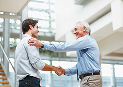 Two gentlemen agreeing a service objective