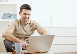 Individual working on a laptop