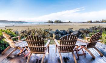 a wooden bench sitting in a chair